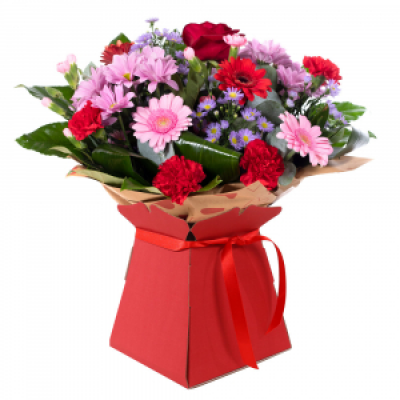 Mrs Kisses
 - Send lots of love and kisses with this classic hand-tied bouquet featuring a selection of romantic flowers finished with a luxurious single red rose.
