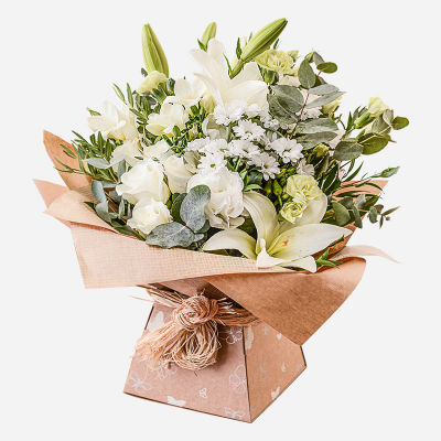 Evelyn - A fabulous collection of white and cream flowers make this the perfect gift .