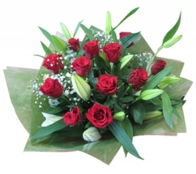 say your love - a delightful classic bouquet of 12 red roses with white oriental lilies. what a romantic gift. say your love today.