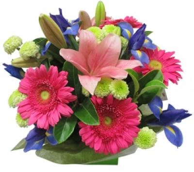 happy glory - bright pink and purple arrangement in a box.