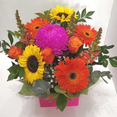 Vibrant Colors - Vibrant Colors bursts forth in a kaleidoscope of hues, an energetic handtied bouquet that celebrates the vivacity of life. Its captivating blend of vibrant flowers ignites joy and