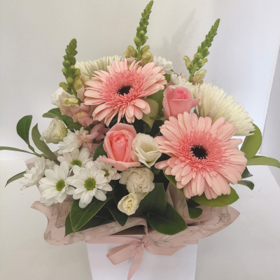 Pink Thoughts - Pink Thoughts is a tender boxed arrangement, delicately composed with blooms in shades of soft pink. This heartfelt arrangement evokes a sense of affection and warmth, reflecting g