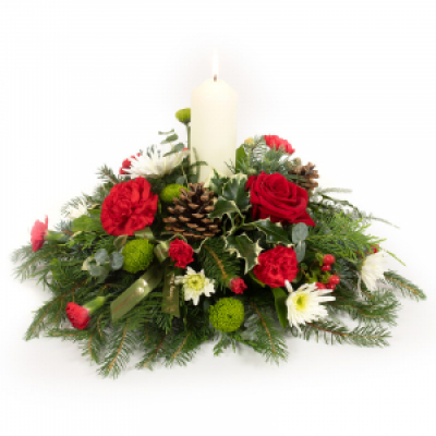 Yuletide Glow - A Christmas candle arrangement, perfect for the festive table, handmade using favourite Christmas flowers and foliage. 
