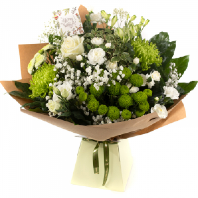 Joy to the World - This dreamy white and green hand-tied Christmas design evokes the spirit of the season in flowers. The perfect way to share joy this festive season. 
